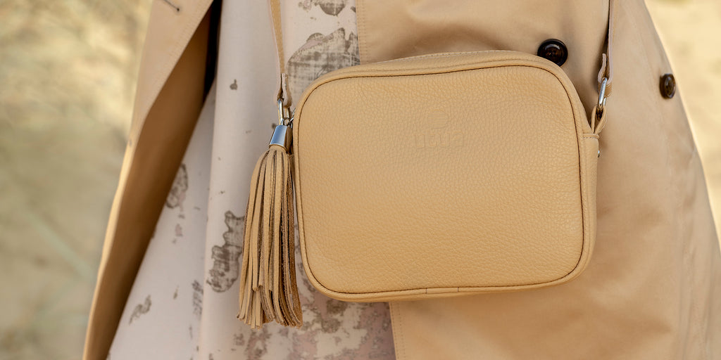 Beautiful leather handbag with a tassel.